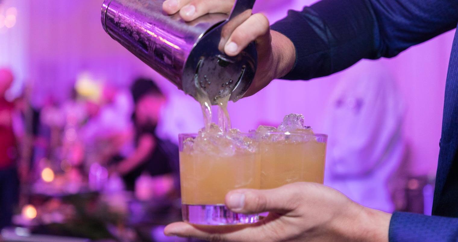 Pouring-cocktails-at-Wonder-of-the-Cocktail-featured image