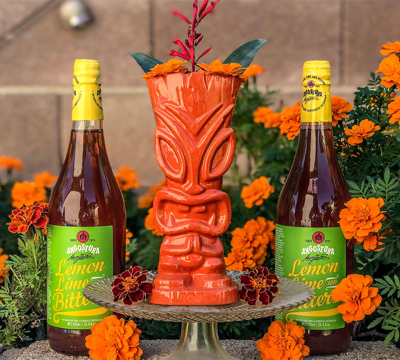 Pretty Bird, tiki cocktail, bottles and flowers