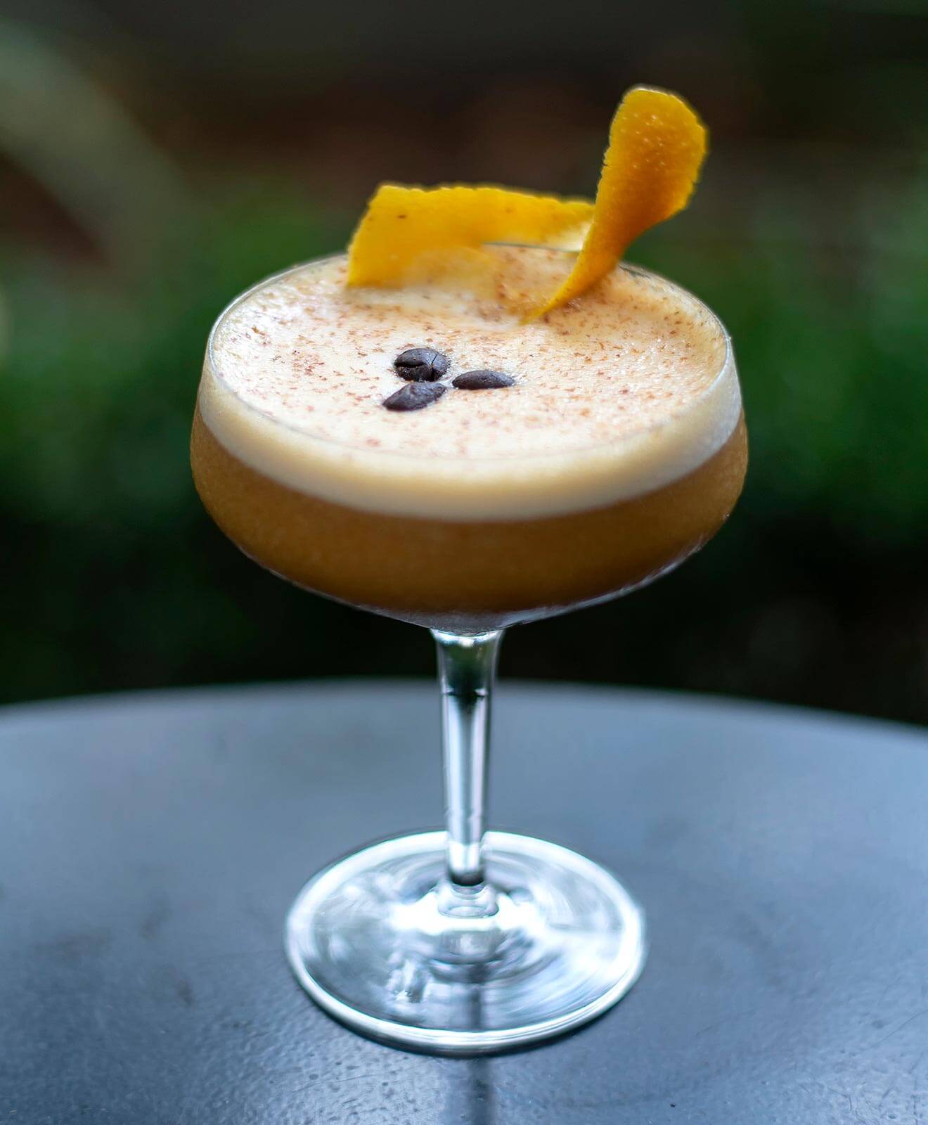 Pumpkin Spiced Latte, cocktail with garnish on table