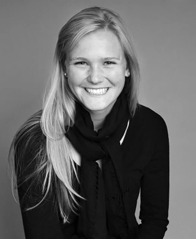 Rachael Pack, smiling portrait on grey