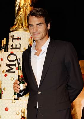 roger federer celebrating moet & chandon