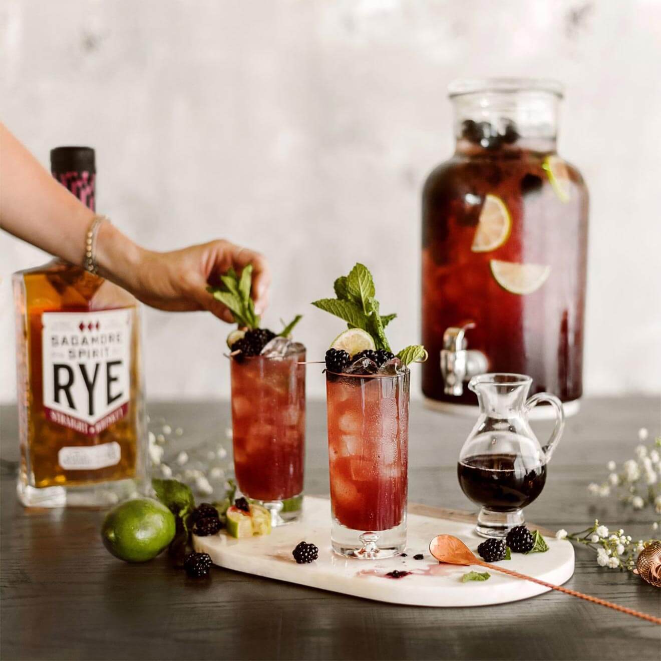 Rye Day cocktail, bottle, glasses, garnishes