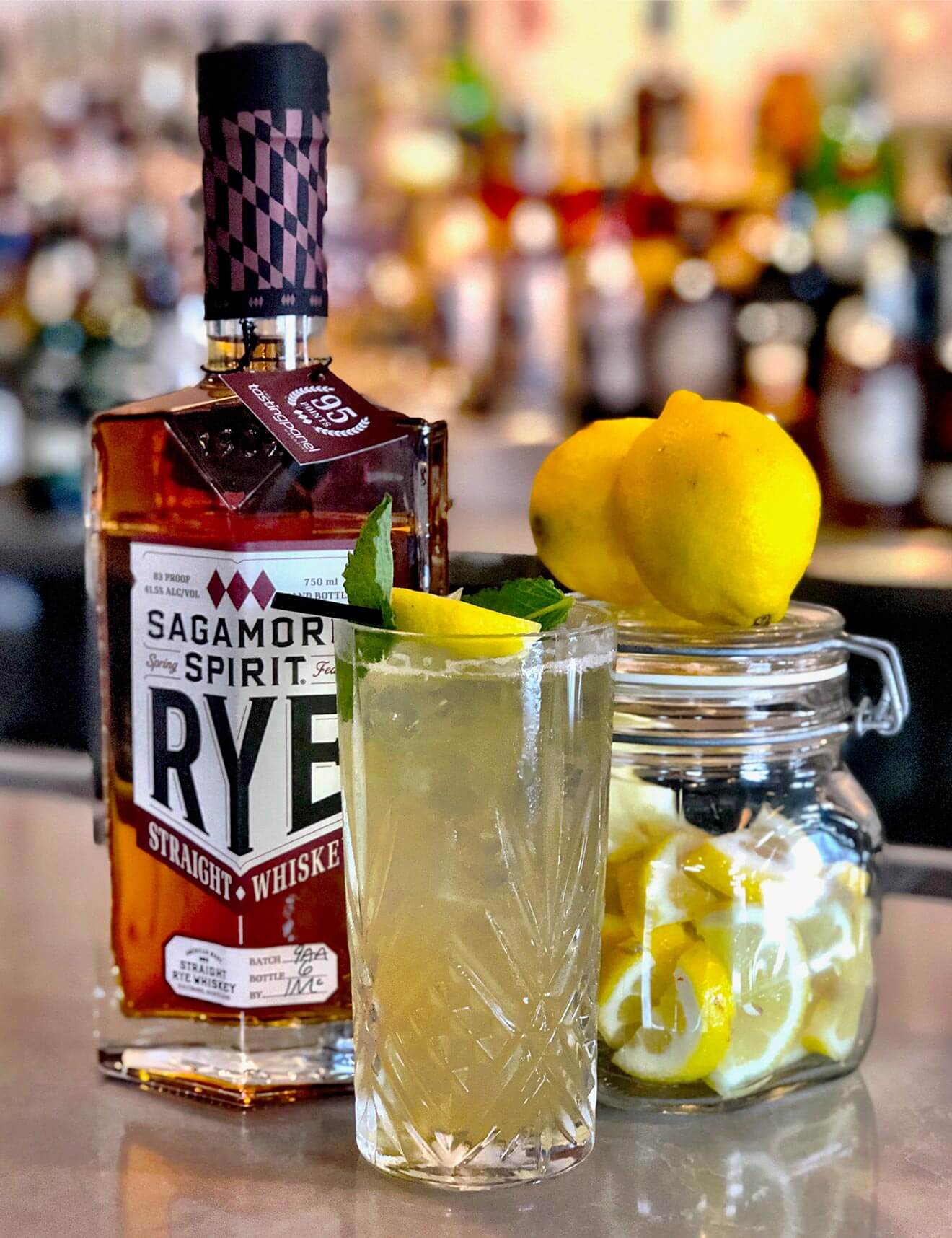 Sagamore Lemonade, cocktail, bottle and garnishes