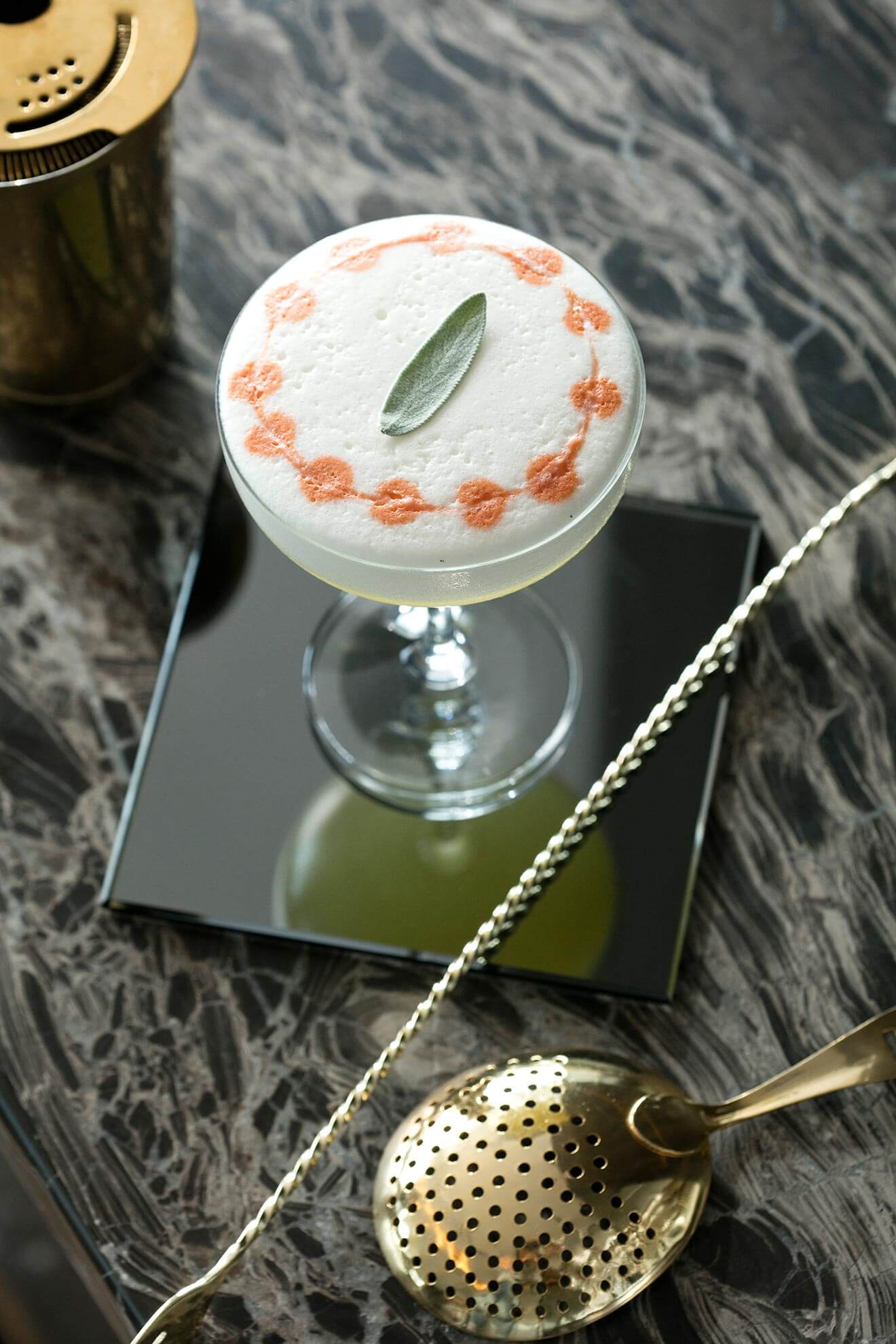 Sage Advice, cocktail with garnish on small plate