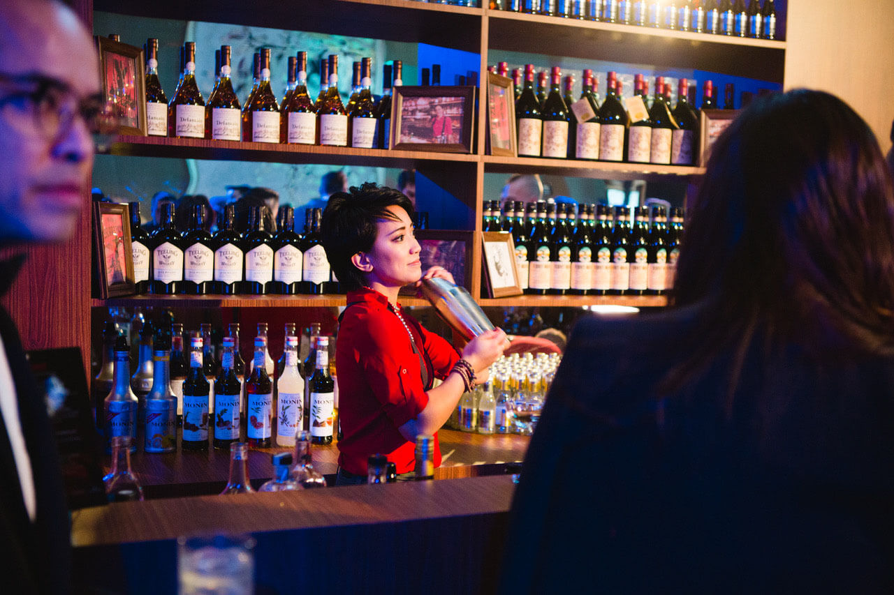 Meet Samantha Casuga</strong></h2> <em>CHILLED 100 Member, New York, shaking up a cocktail behind the bar