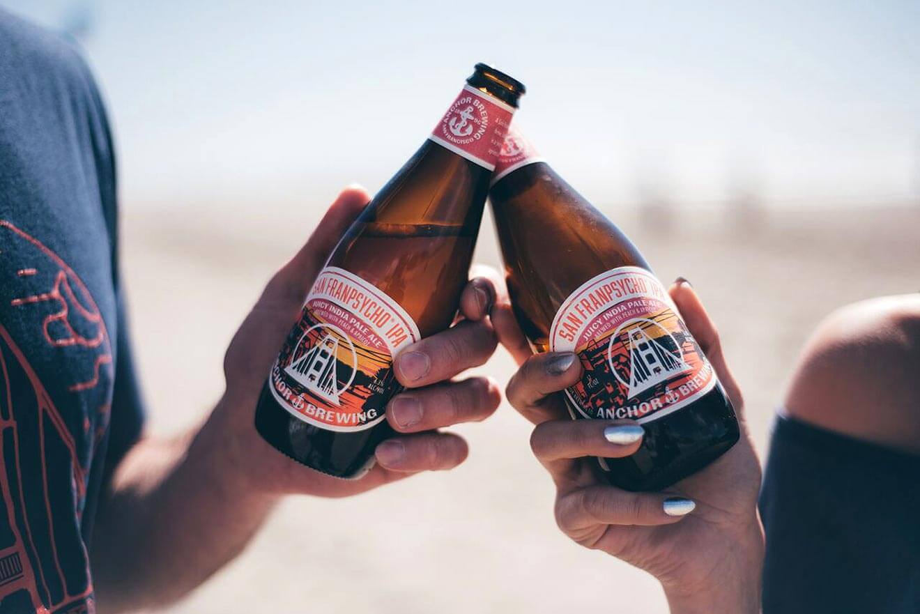 San Franpsycho IPA, friends having a cheers