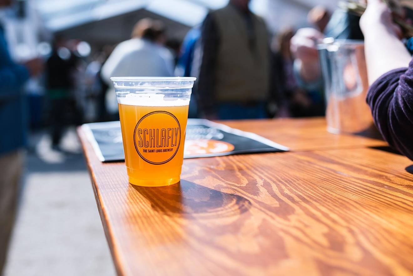 Schlafly, beer in plastic cup on table