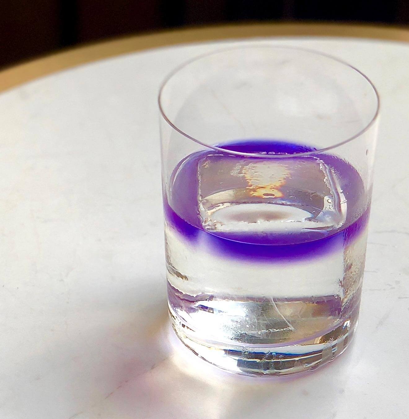 Seasonal Rum Punch, cocktail with garnish on round table
