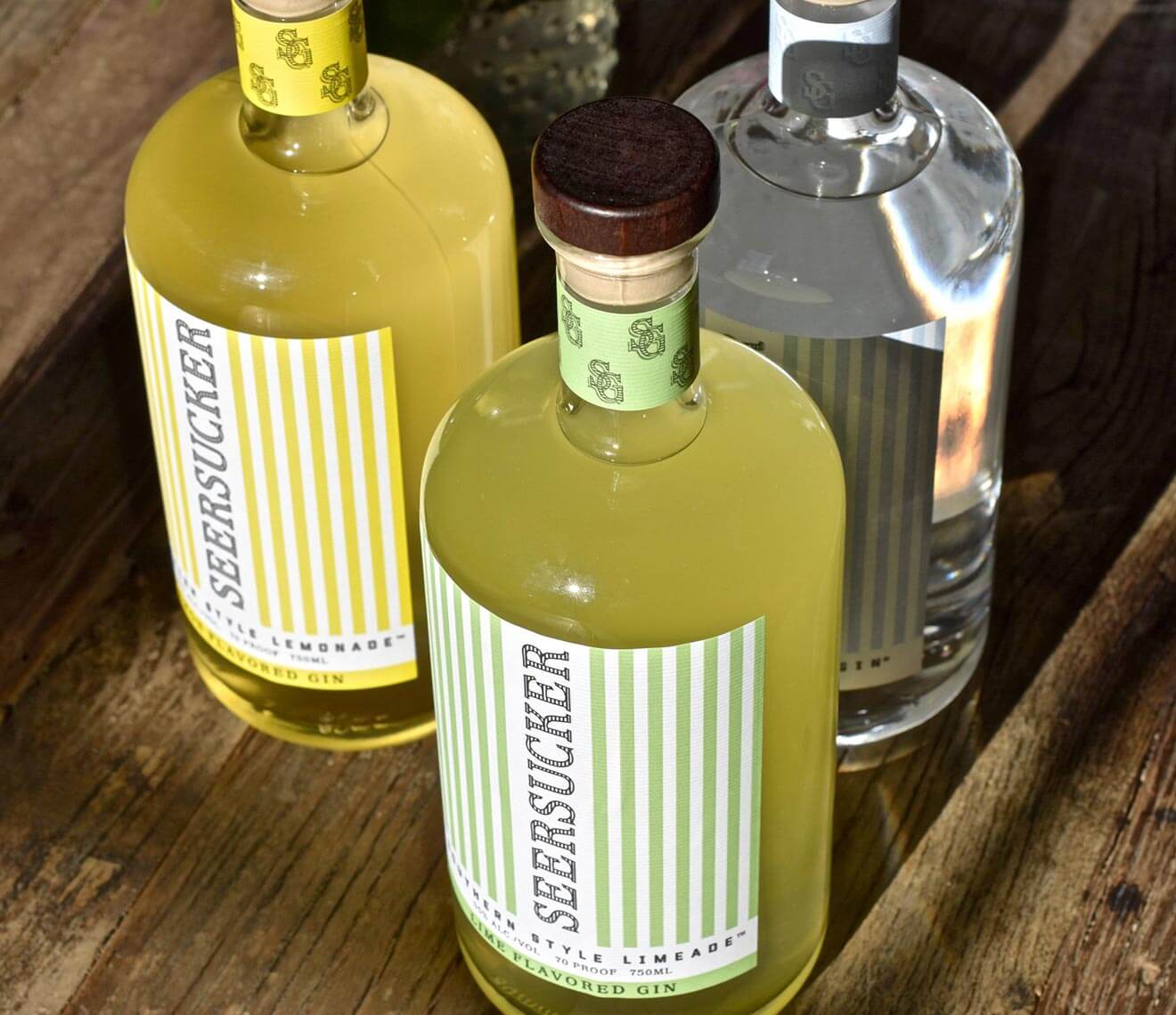 Seersucker Southern Style Gin Lineup, bottles on table