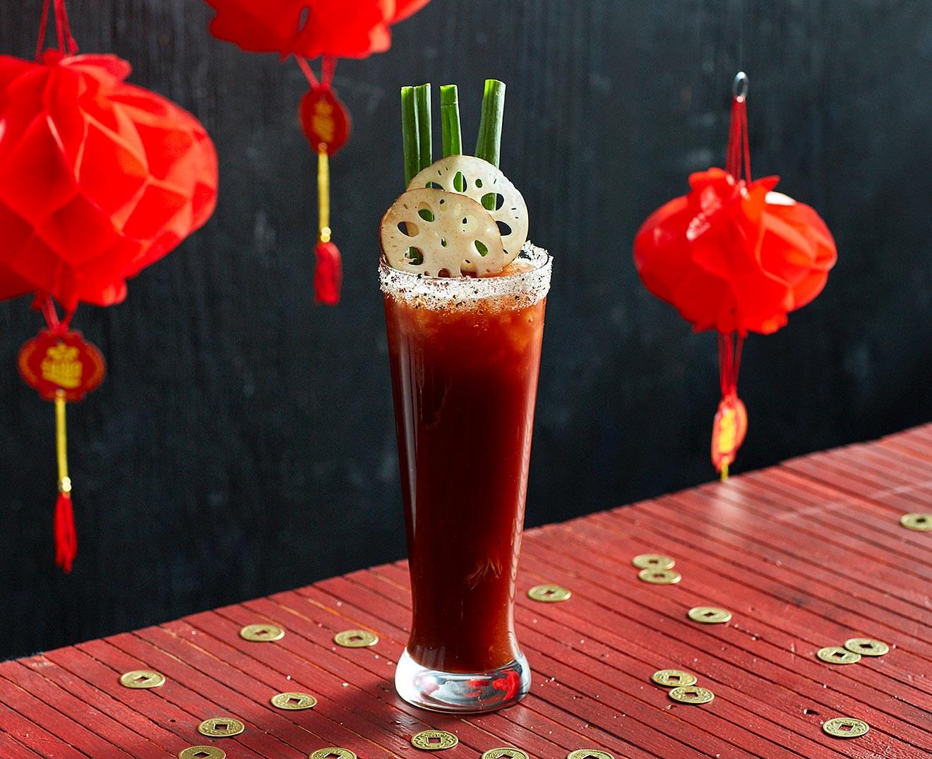 Shanghai Red Eye cocktail with chinese background