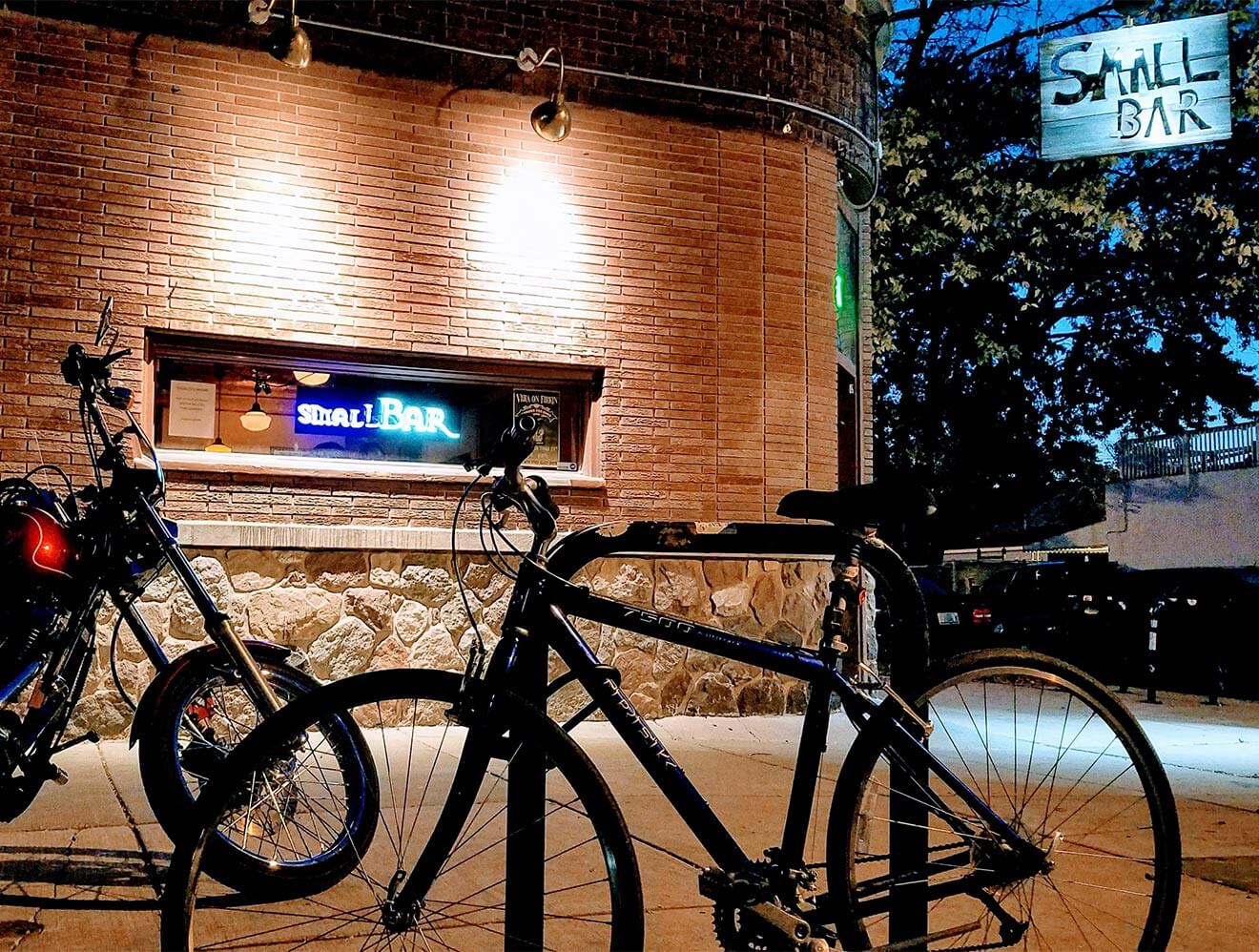 Small Bar, outside view, signage and bike rack