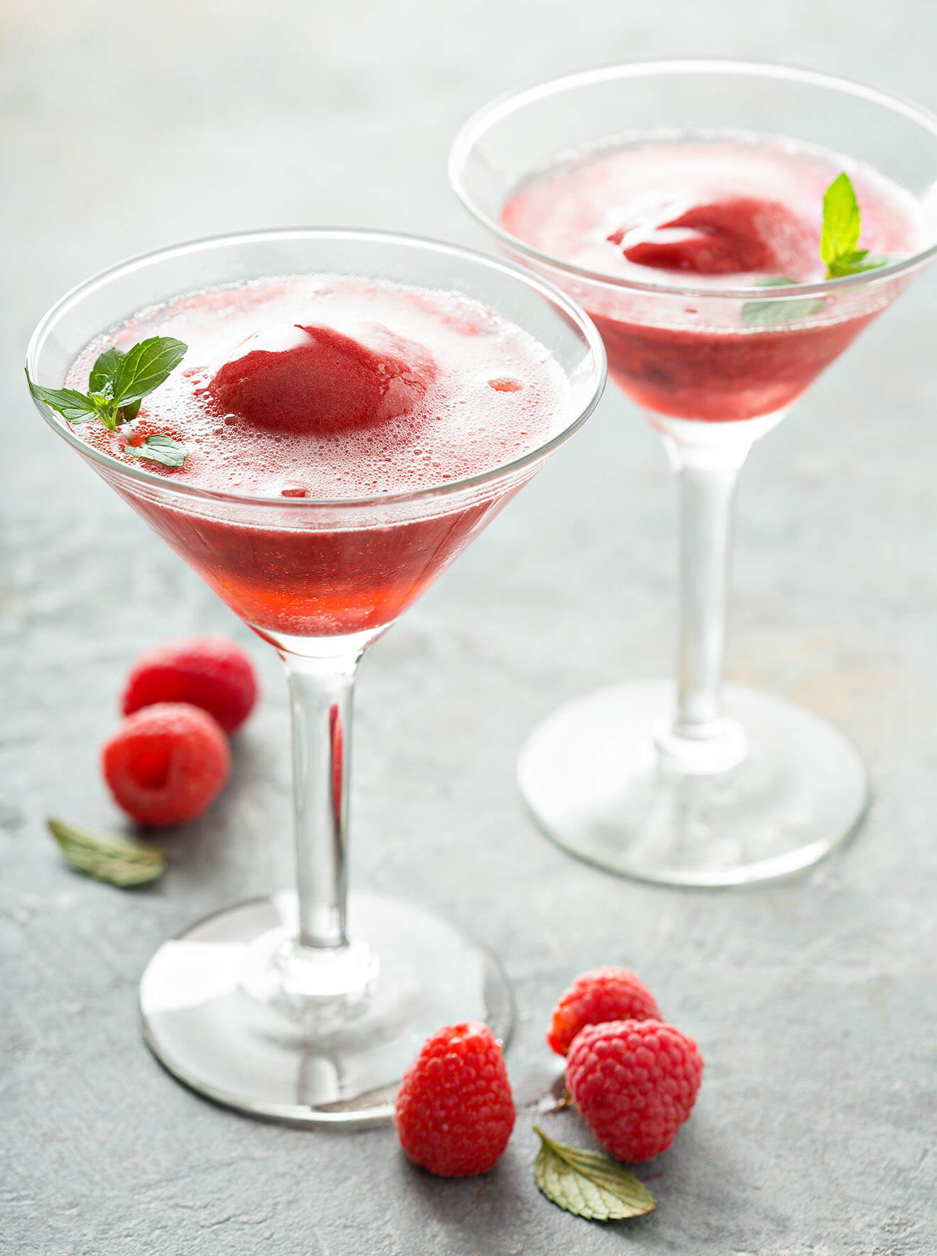 Sparkling rose and raspberry sorbet floats with fresh berries
