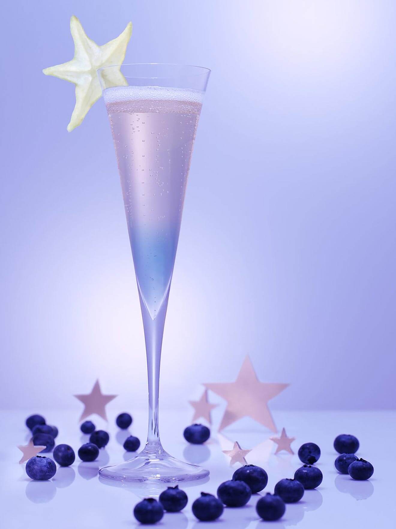 Starry Night cocktail with starfruit garnish