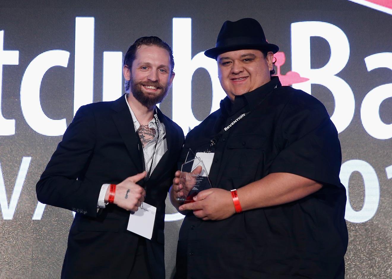 Steve Schneider presents the award for 'Bartender of the Year' to Nectaly Mendoza