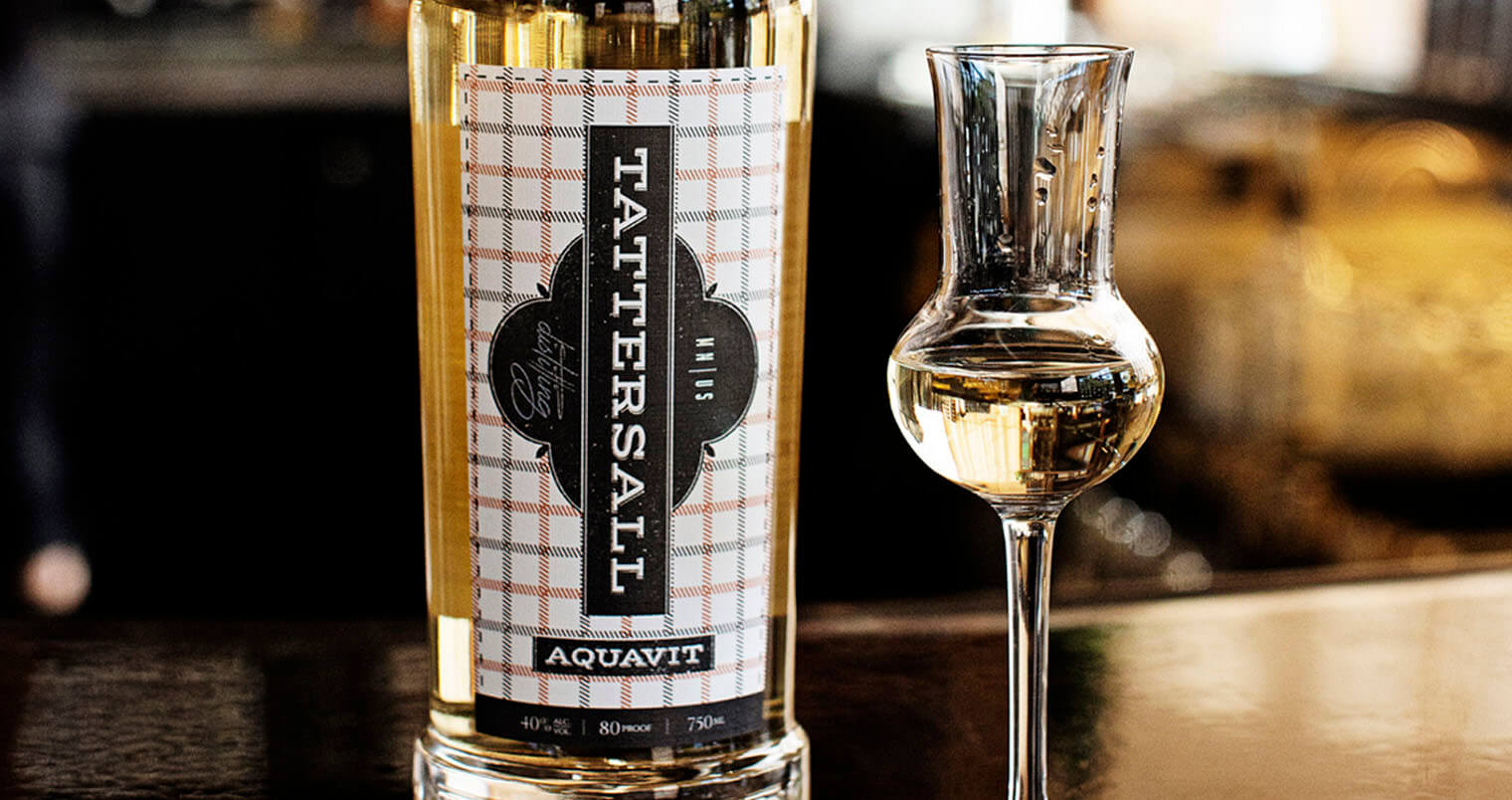 Tattersall Aquavit, bottle and glass on bar, featured image