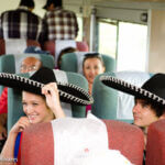 Tequila Express Smiling Couple in Sombreros