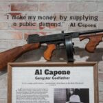 Al Capone display with article and gun