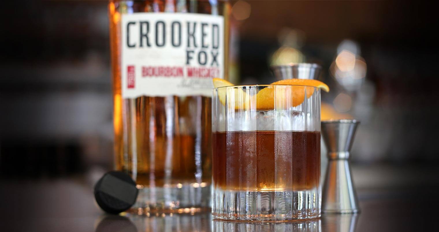 Crooked Fox Bourbon Whiskey, bottle and cocktail, featured image