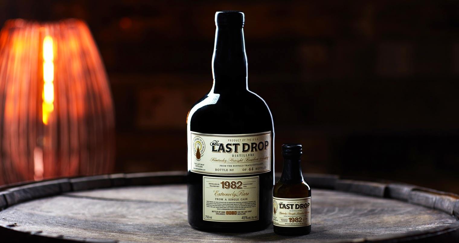 The Last Drop 1982 Bourbon, bottles on barrel, featured image