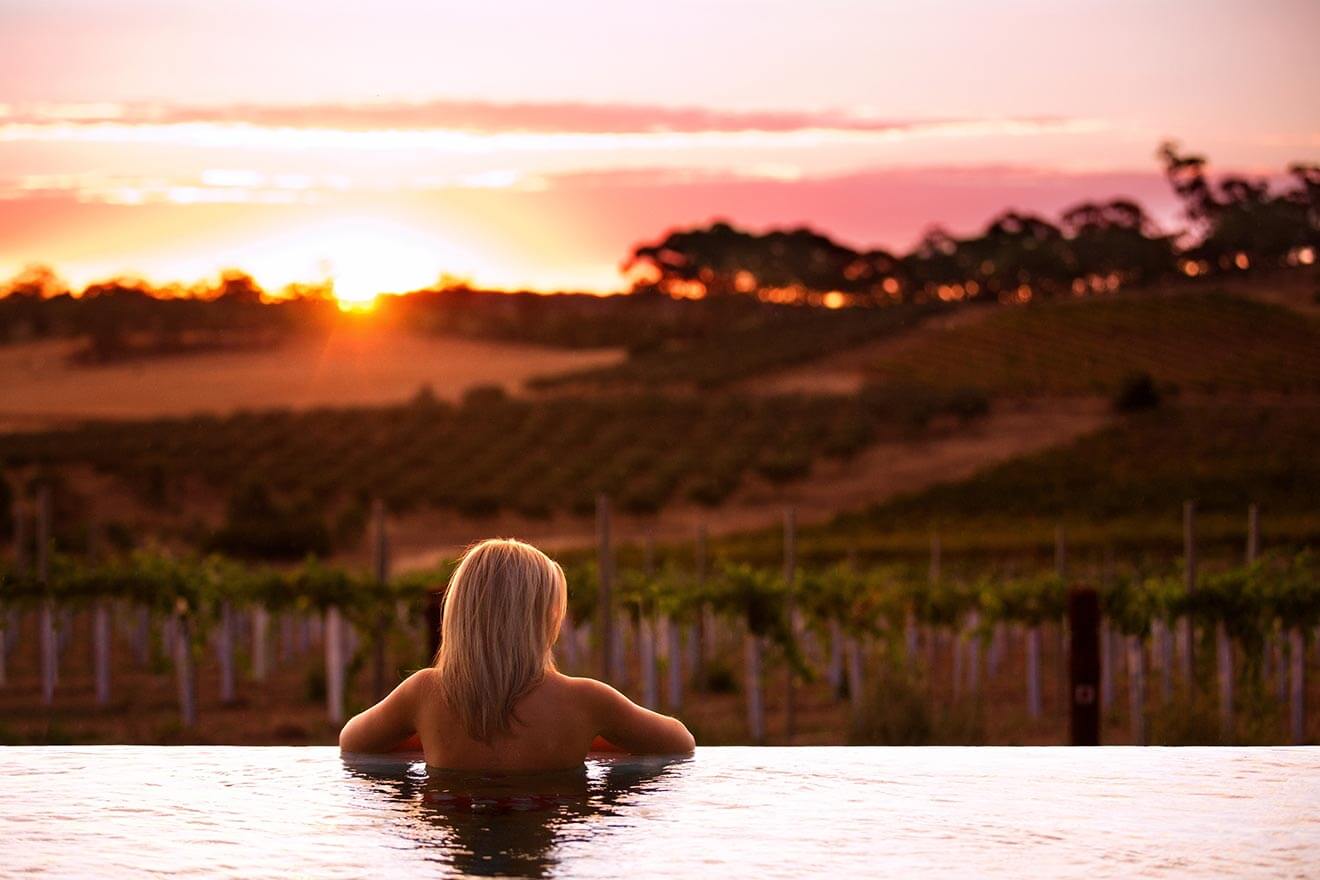 The Louise resort, woman in pool overlooking vineyards