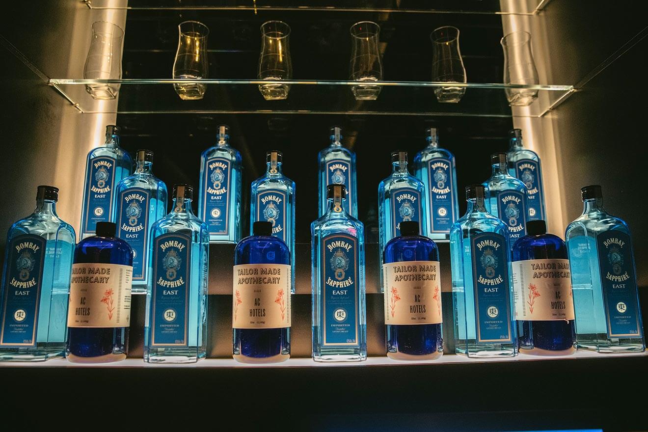 The Right Glassware is Everything, bottles on bar display