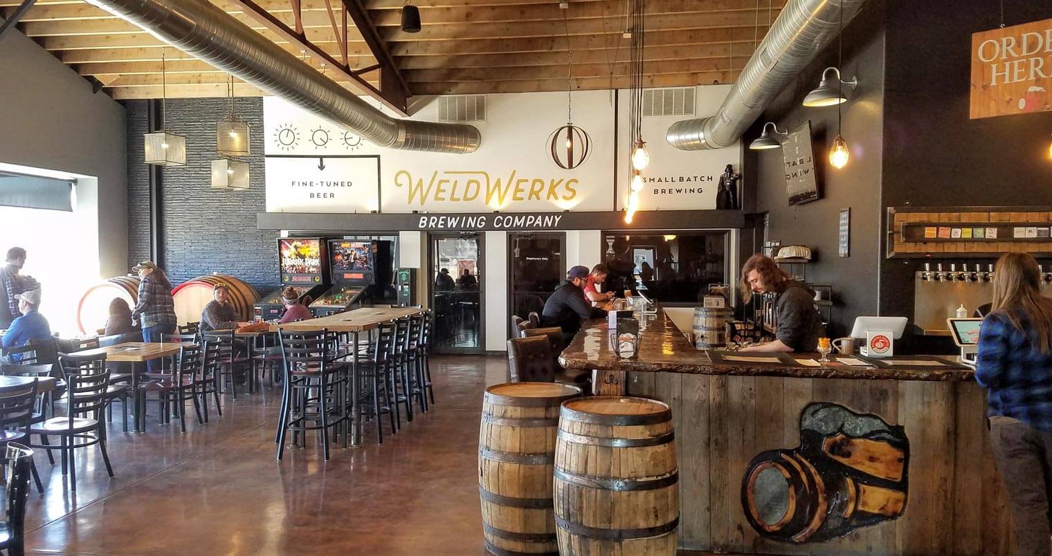 WeldWerks Brewing, bar patrons enjoying, featured image