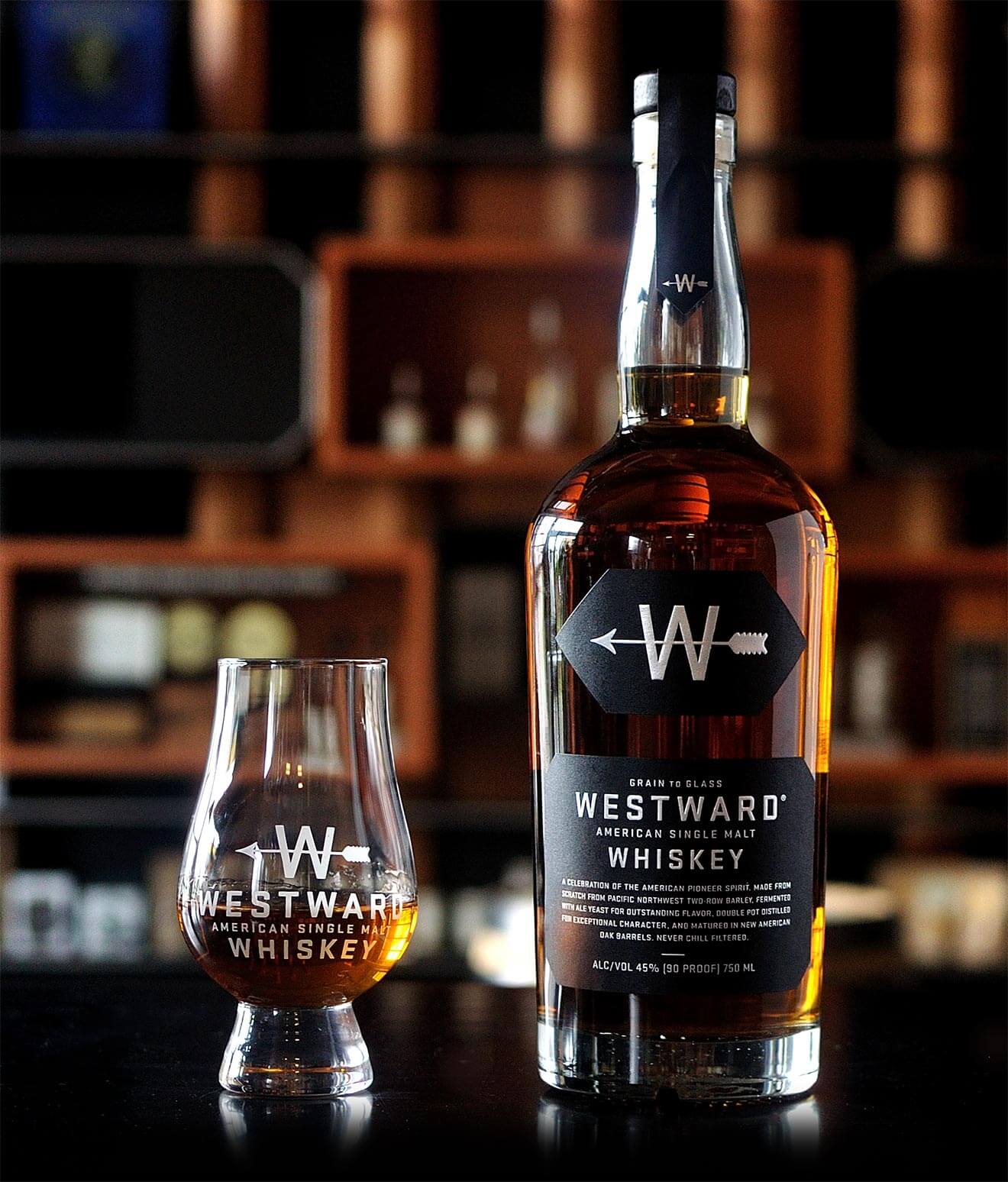 Westward Whiskey glass and bottle