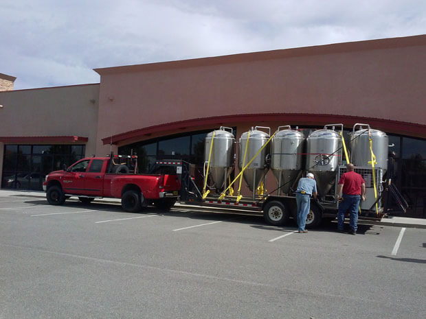 The 3.5 BBL system is moved from Bosque Brewing in ABQ to Los Alamos. The equipment will be stored locally until the space is ready for installation.
