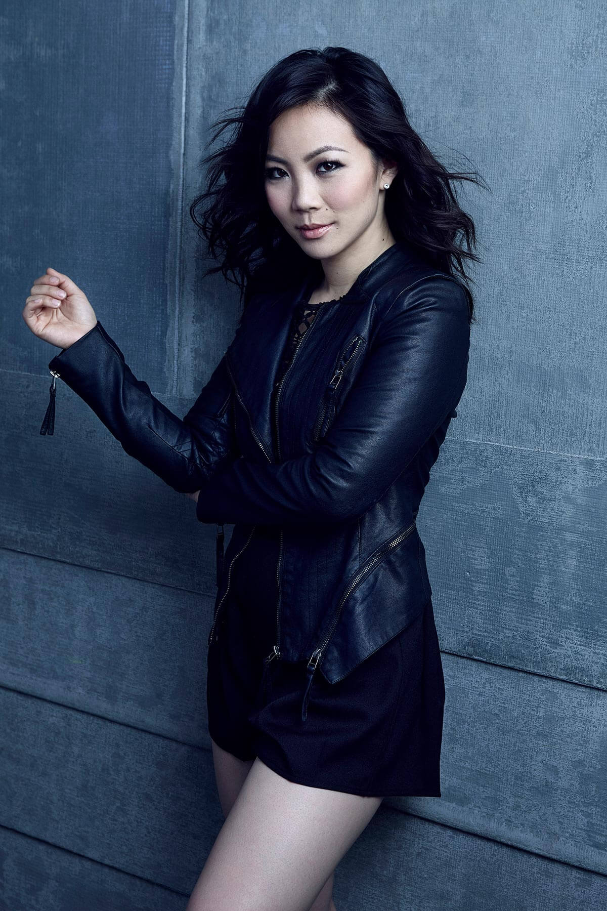 Chillin' with Jona Xiao, black miniskirt, dark wall