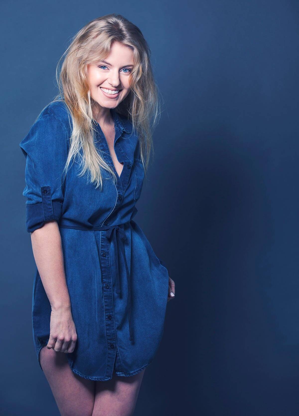 Chillin’ with Sarah Minnich, blue dress, blue background