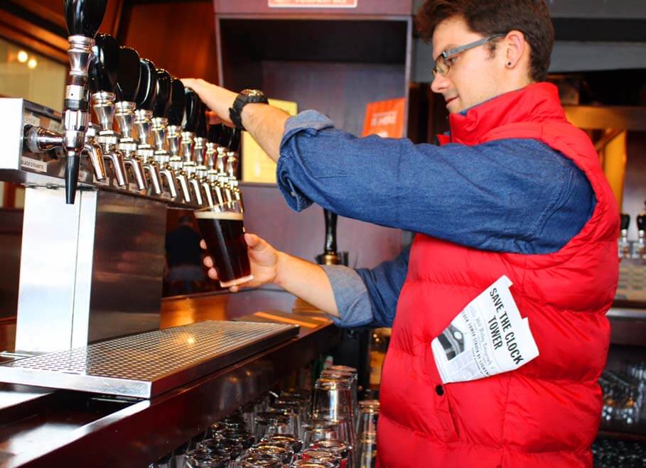 Brewer, Andrew Johnston, pouring a Doc Brown Ale