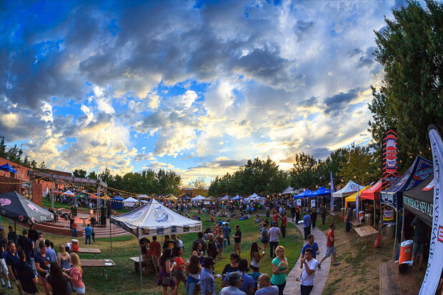Festival-goers enjoying the 60+ breweries lining the Clark County Amphitheater at Motley Brews’ 2014 Downtown Brew Festival.
