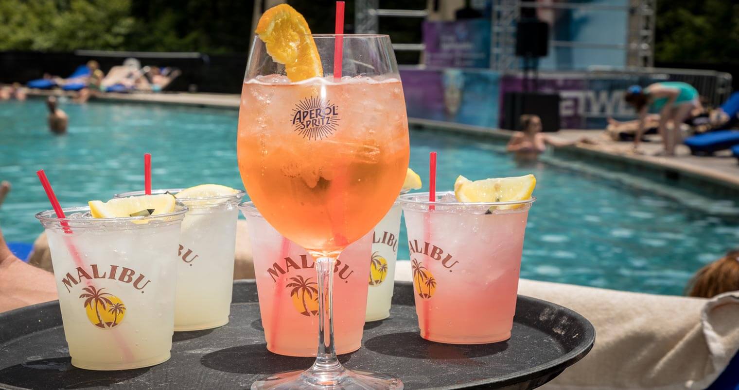 Foxwoods Resort Casino's "Splash Into Summer" Pool Party, cocktails on serving tray, poolside