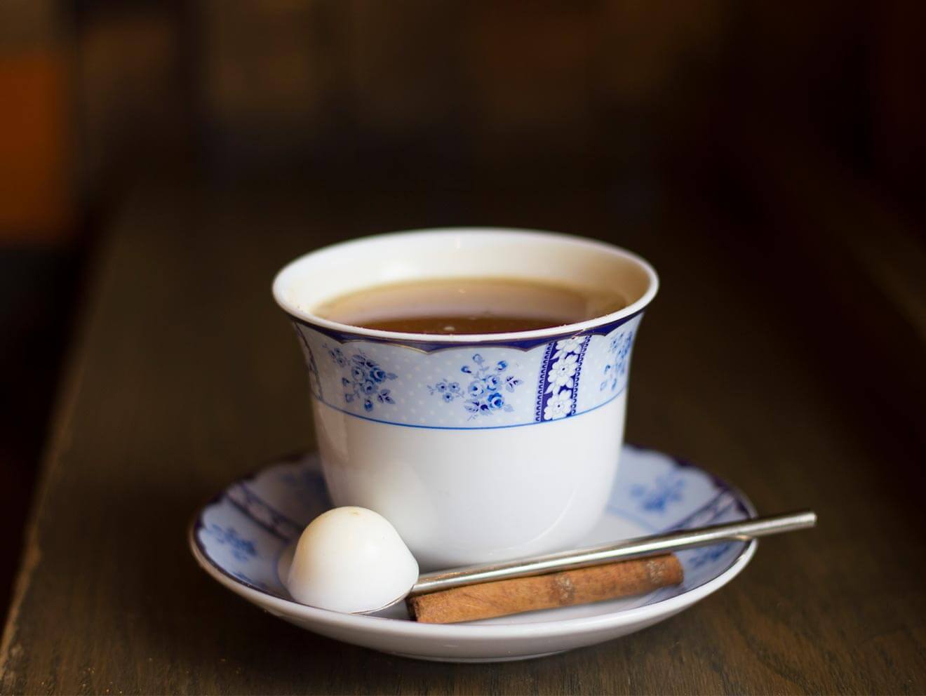 Hot Coco Rum, tea cup with garnish and spoon
