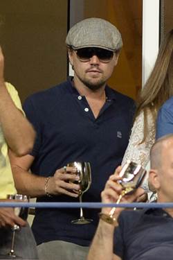 Leonardo DiCaprio enjoys the matches from the Moet & Chandon Suite at the US Open.