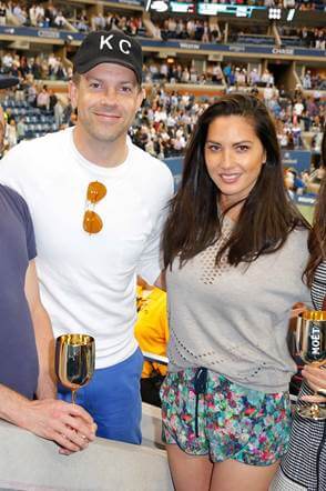 Jason Sudekis and Olivia Munn toast to the US Open Finals from the Moët & Chandon suite.