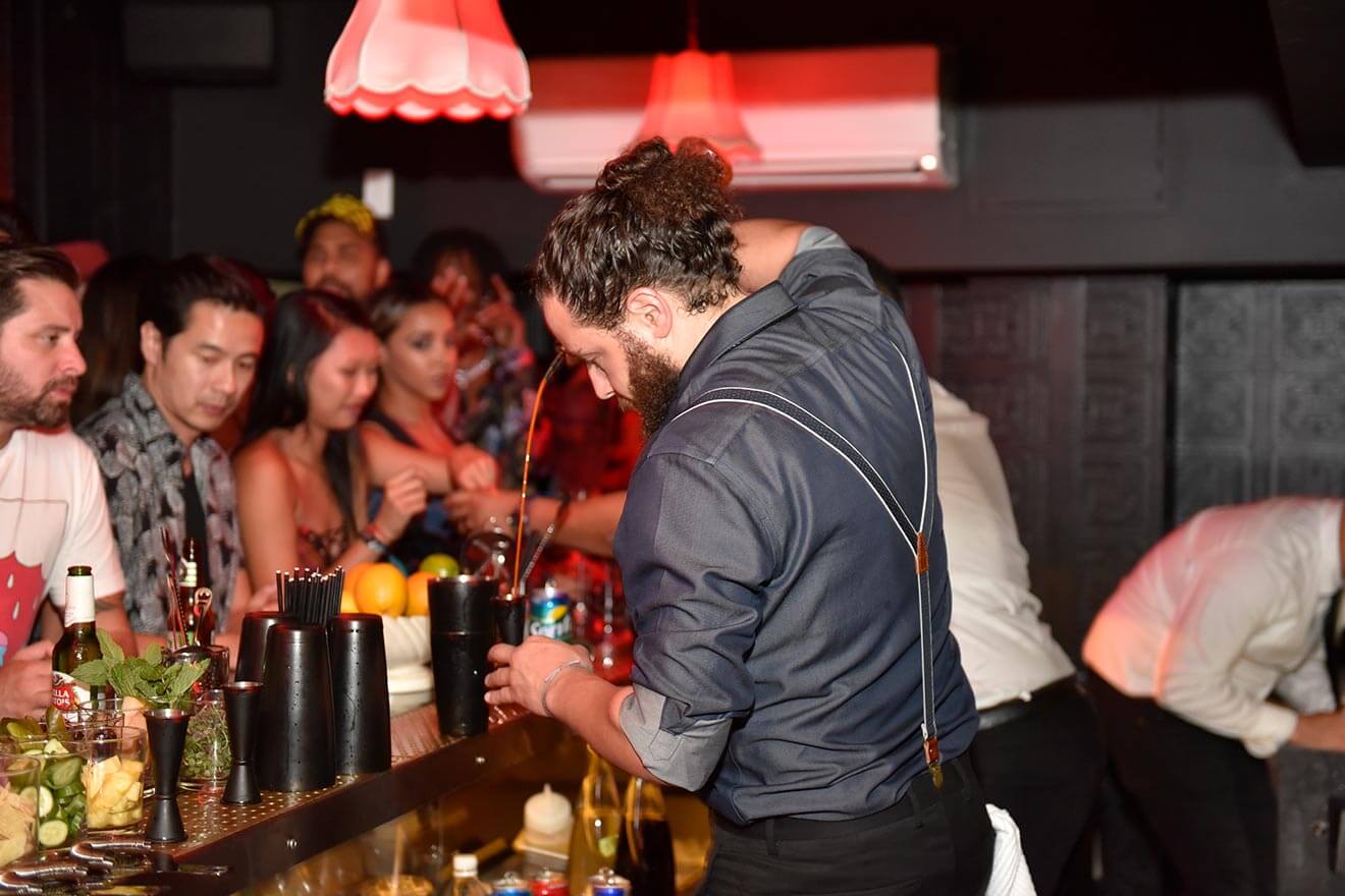 justin campbell, pouring drinks for a crowd