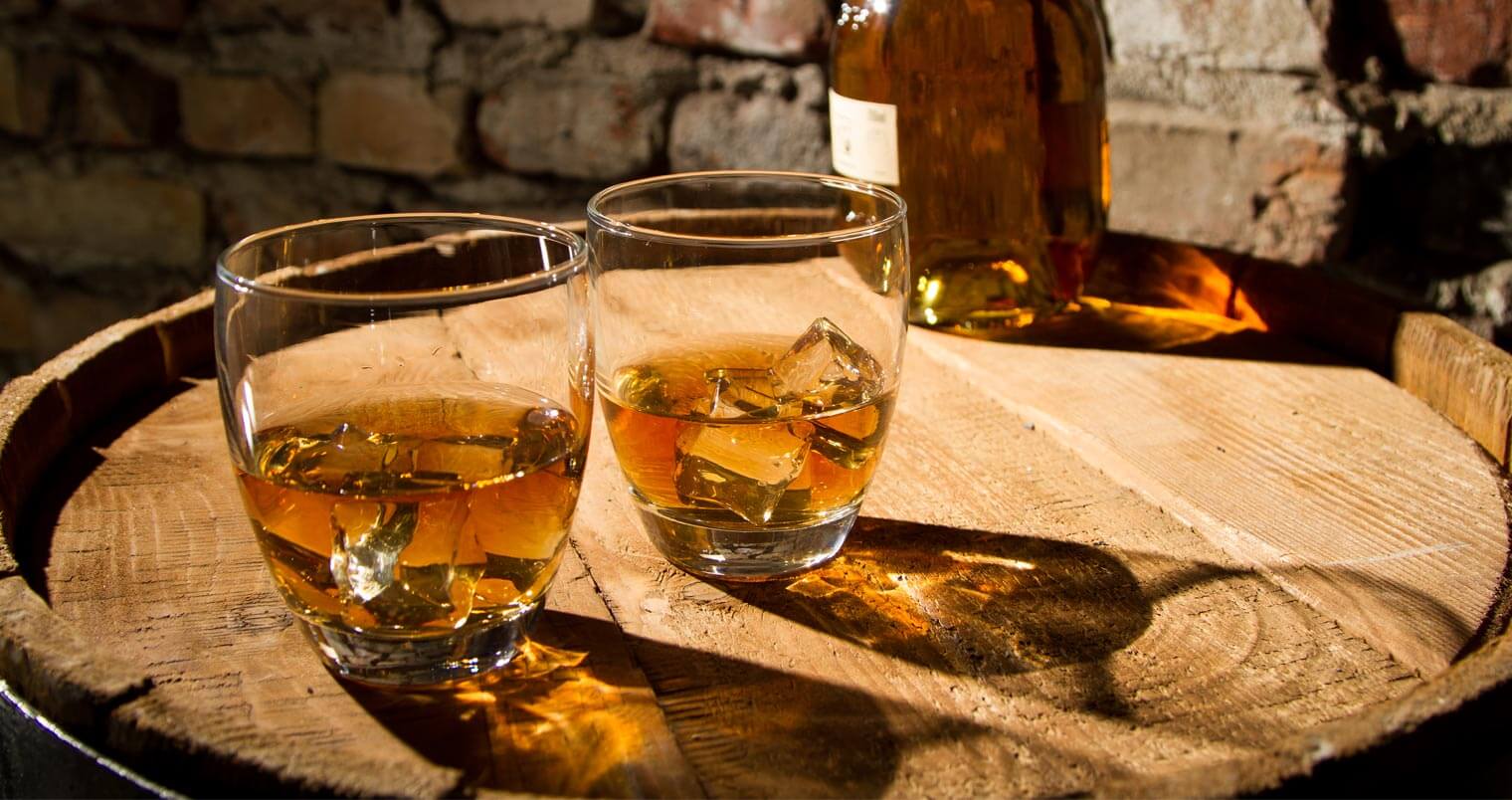Bourbon barrel with glasses