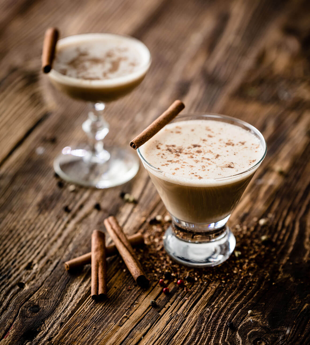 Mr. Black Eggnog, cocktail and garnish on wooden table