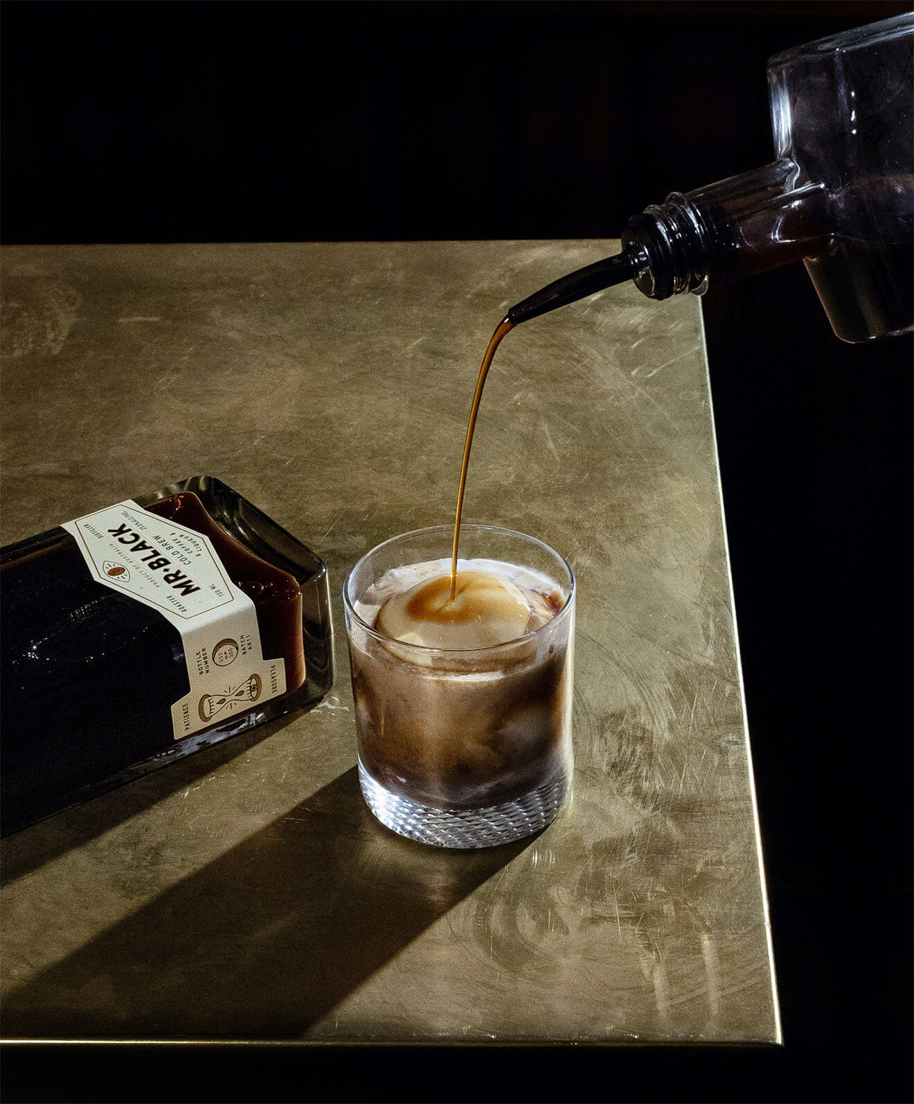 Mr. Black Boozy Affogato, high pour, wood table