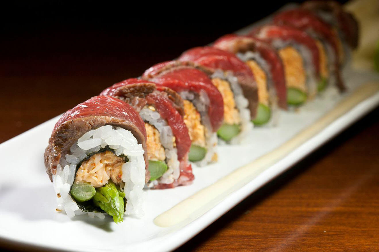 The Oscar Roll beef tataki, snow crab, asparagus, lemon dressing