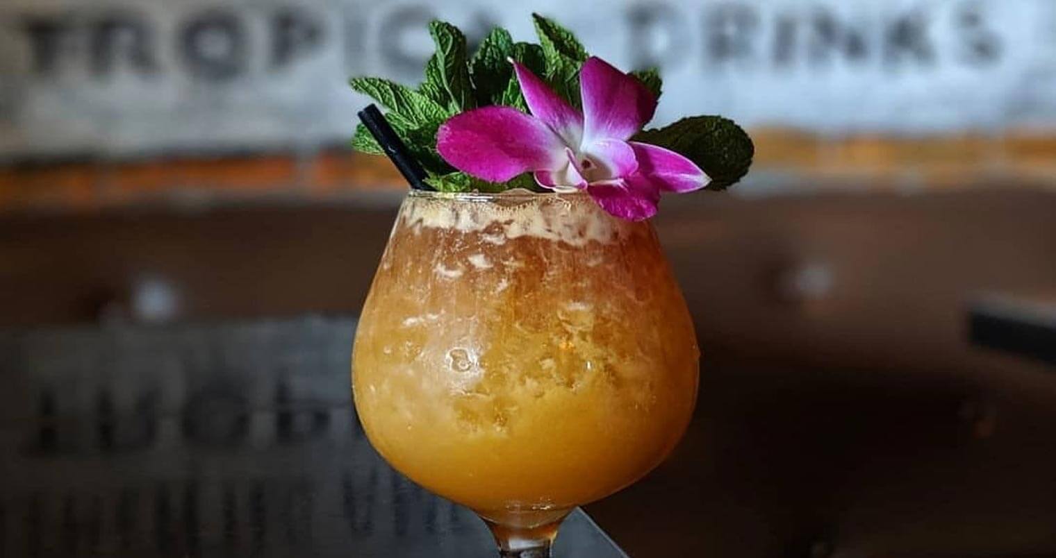 Peachy Texas Tiki, cocktail with garnish, featured image