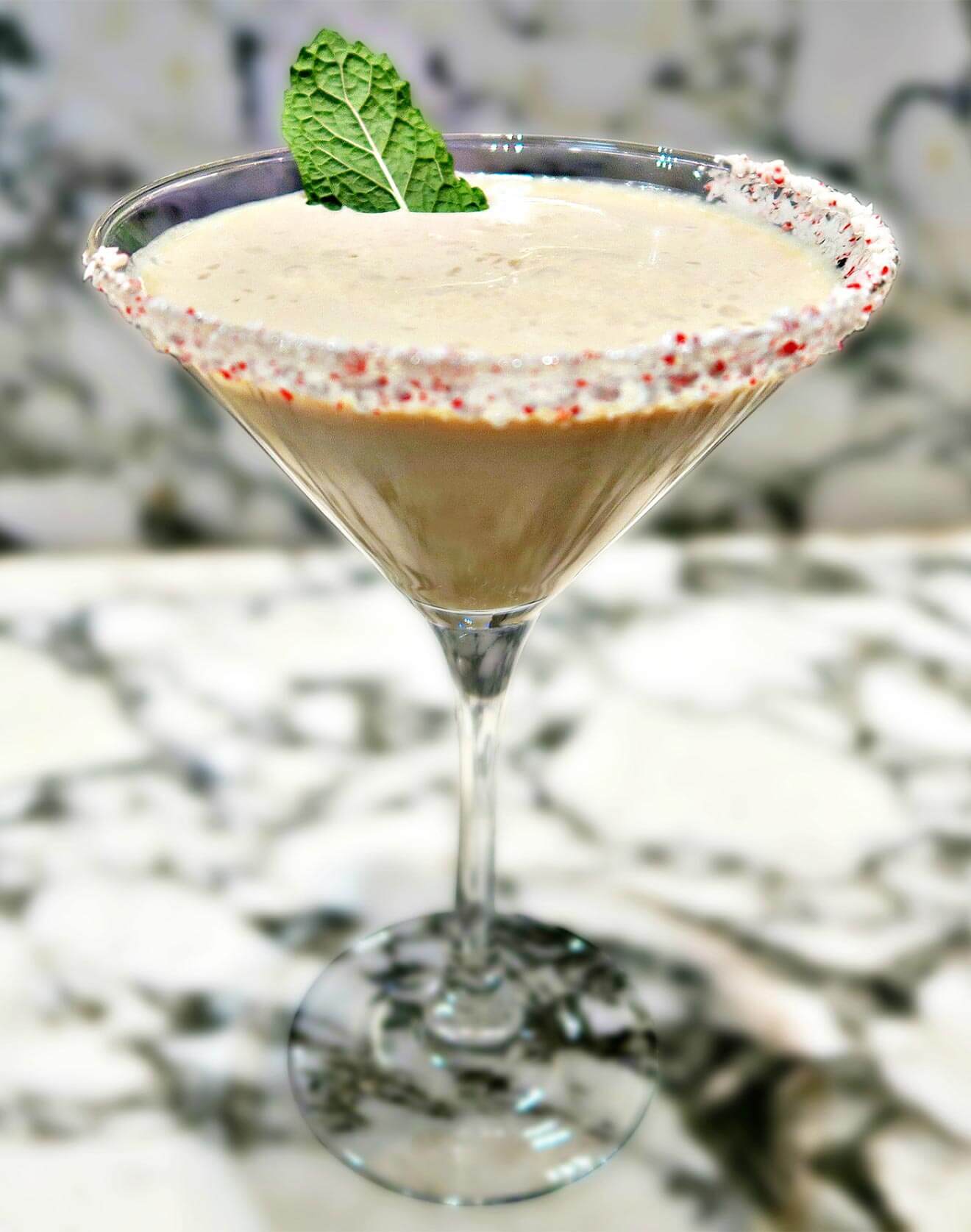 Peppermint Bliss martini cocktail with candy cane rim