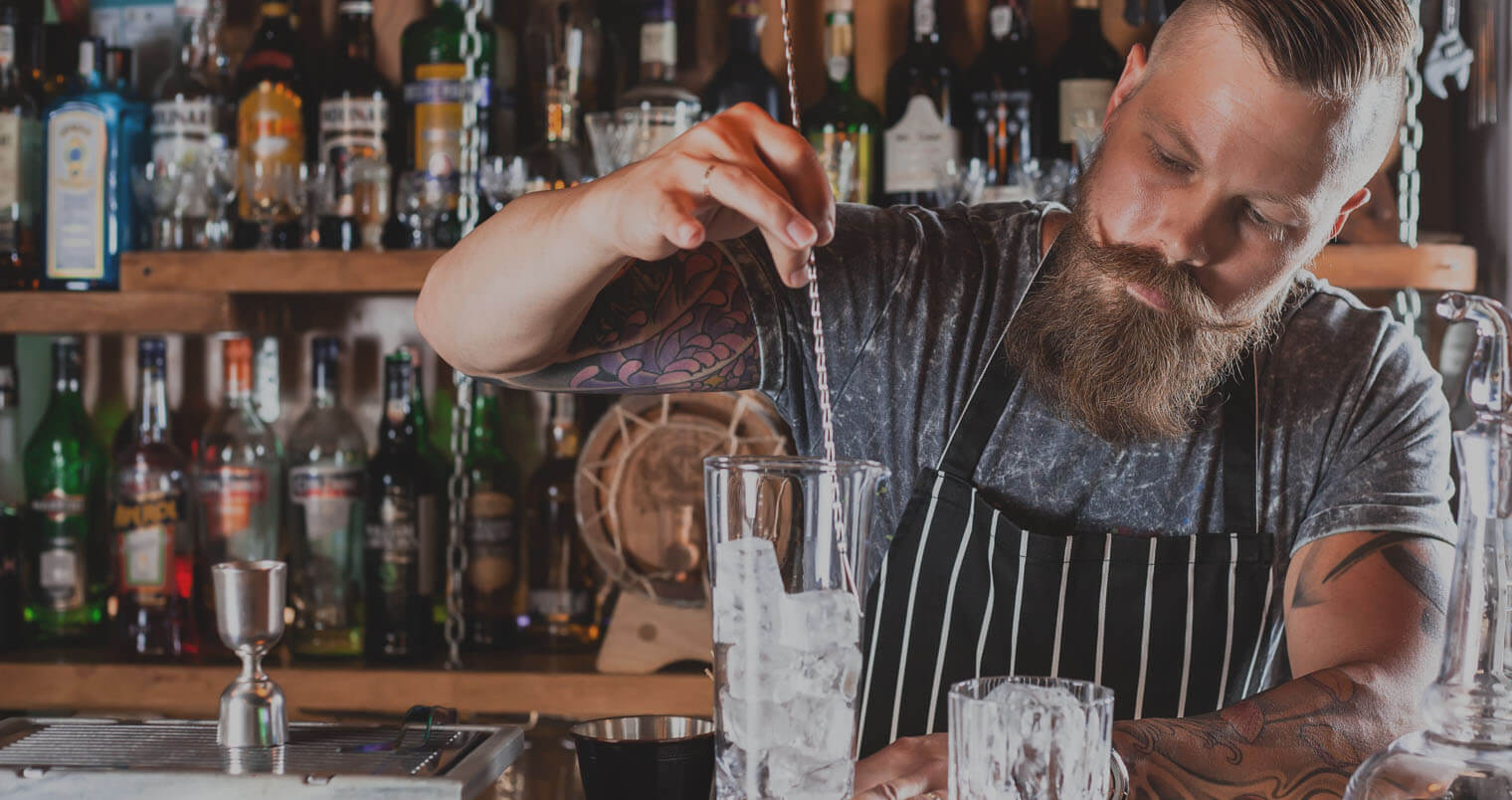 Personalizing Your Style, mixologist mixing behind the bar, featured image
