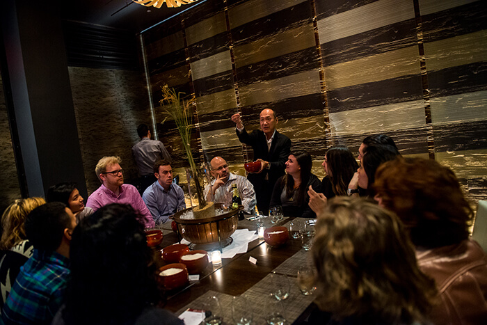 Sidney Frank Importing Vice President of Sales Yoshi Yumoto educates attendees on the differences between different types of polished rice used in the sake brewing process