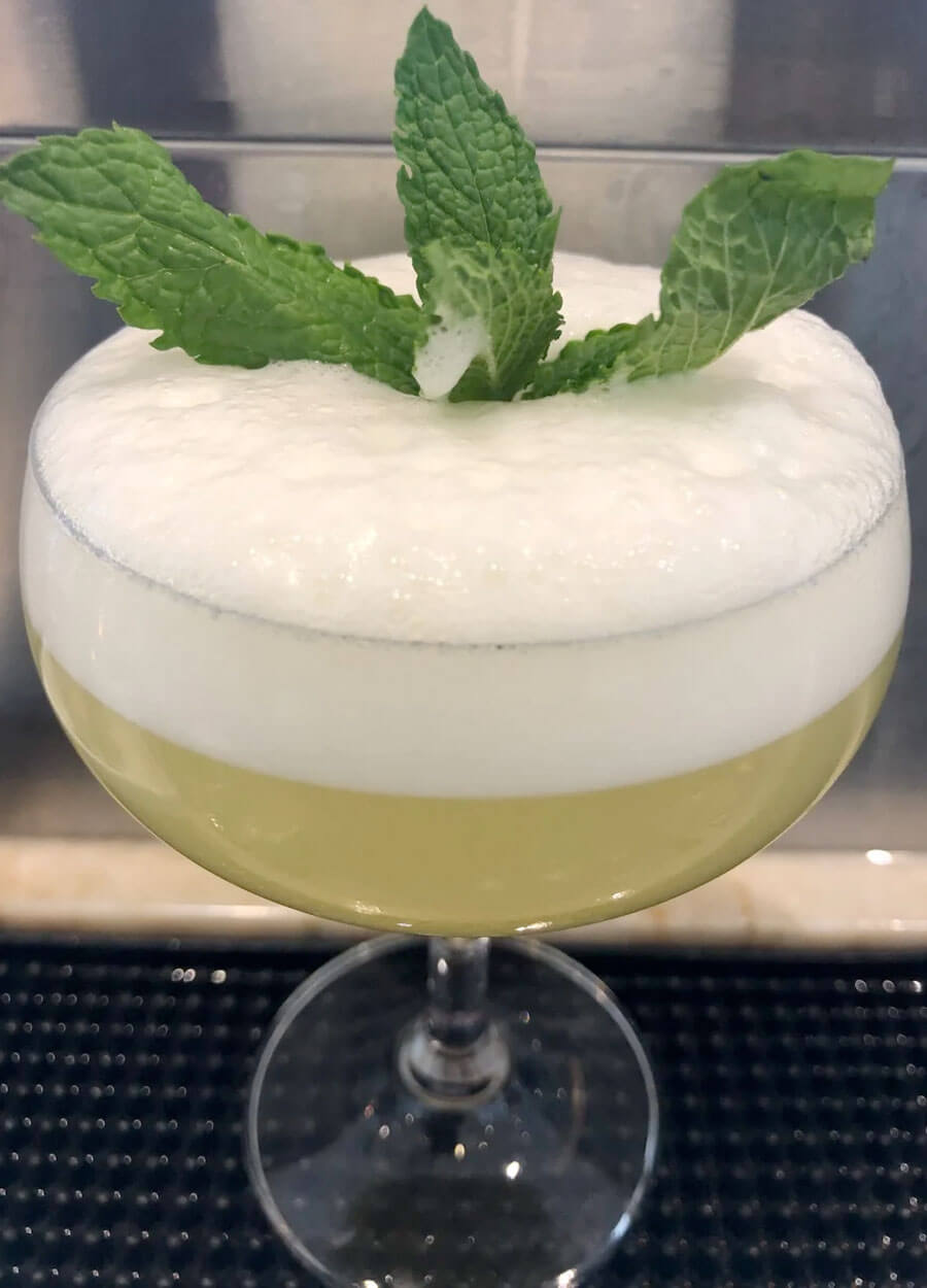 Starry Night, cocktail with herb garnish