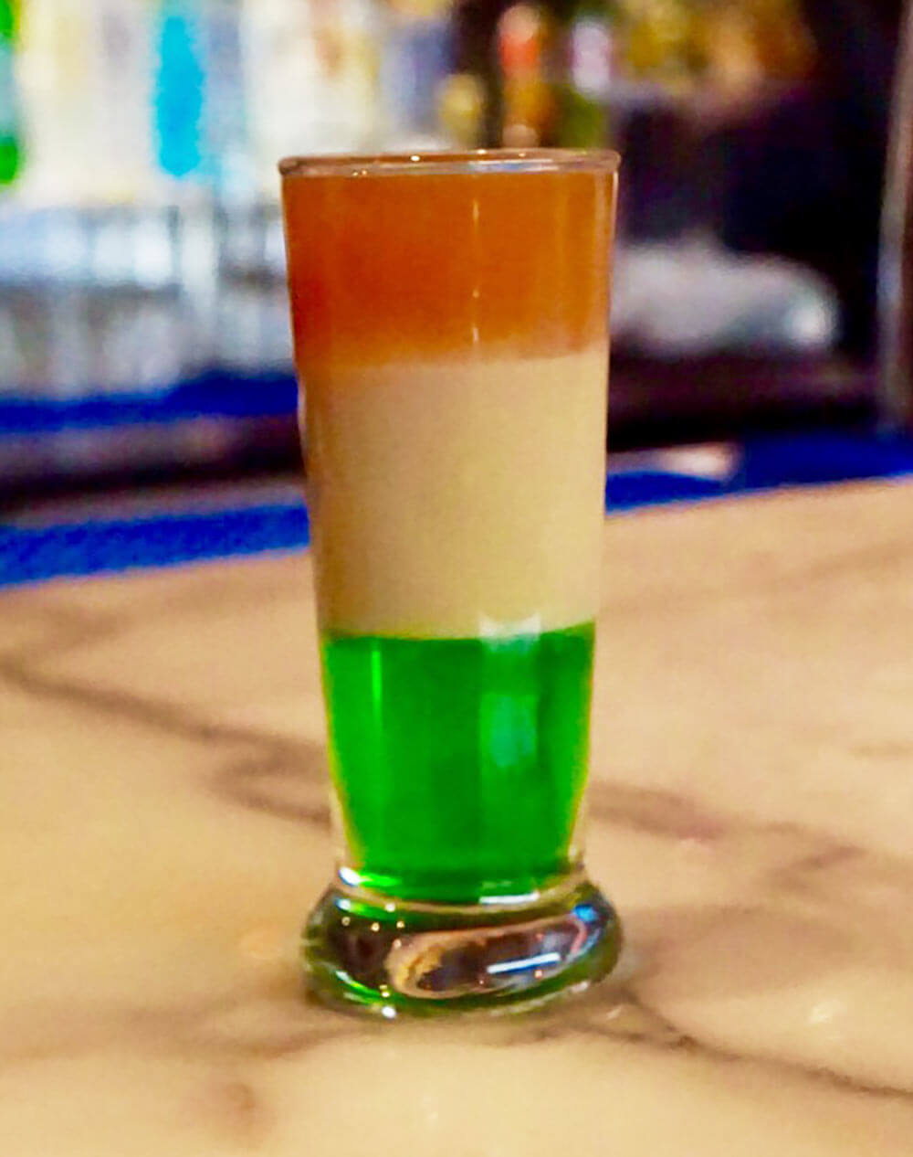 The Sláinte cocktail, layered shot in the colors of the Irish Flag, st. patricks day, cocktail recipes