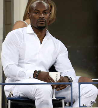 Model Tyson Beckford watches the matches
